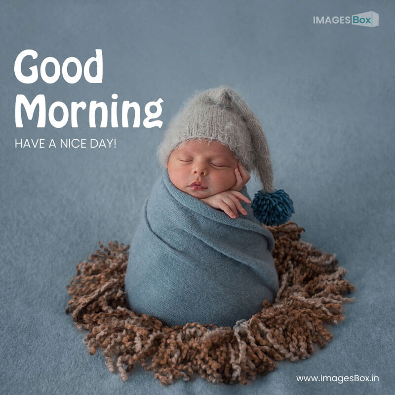 Good morning baby - newborn baby with white beret wrapped with blue shawl 2023