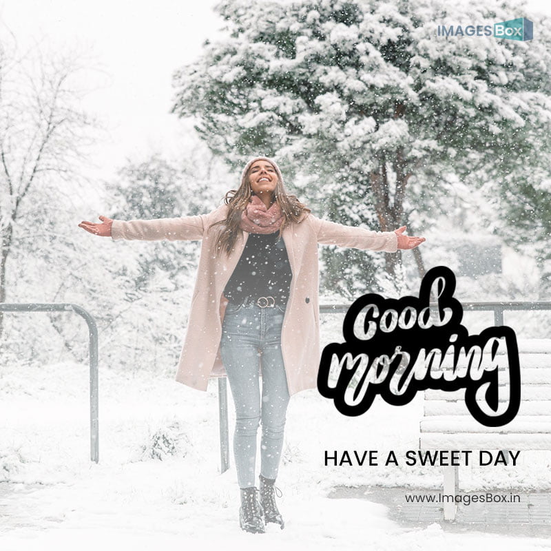 good morning winter-carefree woman warm clothes turning around with outstretched arms while enjoying snowy 2023