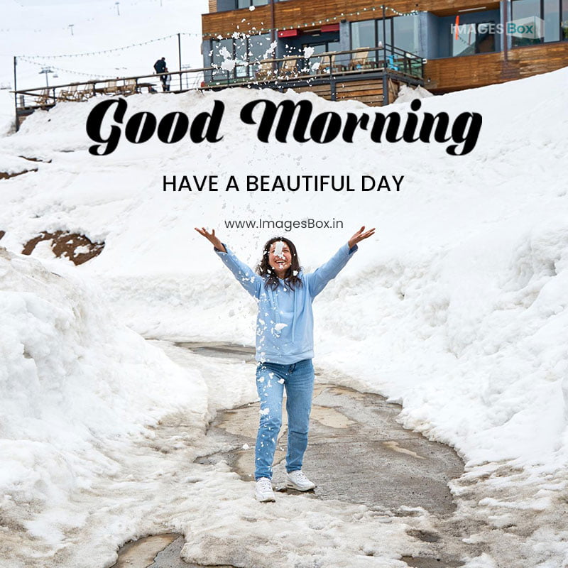 good morning winter-happy girl plays with snow mountains snowdrifts are higher than her height 2023